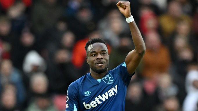 Maxwel Cornet celebrates while playing for West Ham