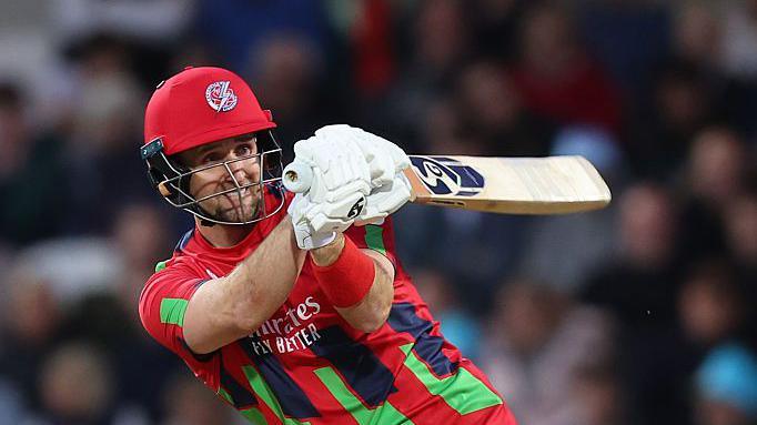 Liam Livingstone whipping a shot away through the legside, batting for Lancashire in a T20 game