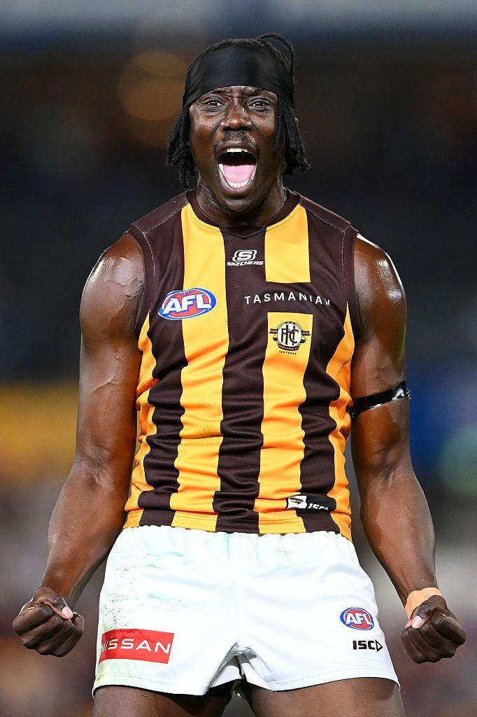 The Hawks' Mabior Chol celebrates kicking a goal during the round 24 AFL match between Brisbane Lions and Hawthorn Hawks at The Gabba in Brisbane, Australia. Photo by Matt Roberts