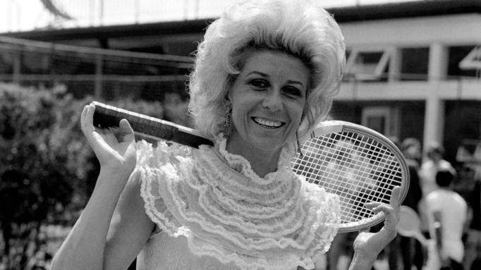 Pericoli wearing a Victorian lace tennis outfit at Wimbledon