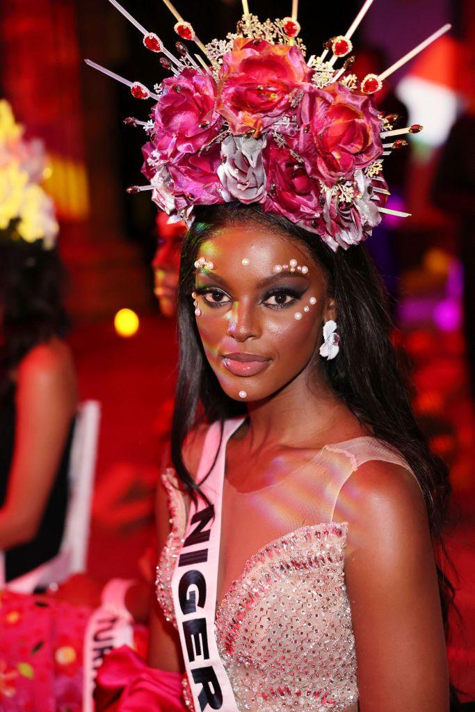 Chidimma Adetshina attends the Miss Universe Catrinas Gala wearing a sequined pink dress and a Nigeria sash - Friday 1 November 2024