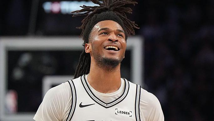 A smiling Stephon Castle in action for the San Antonio Spurs