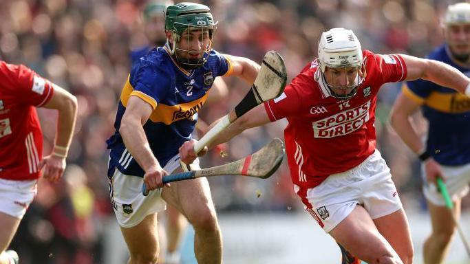 Tipperary's Robert Doyle and Patrick Horgan of Cork in action during the Hurling League Division 1A final