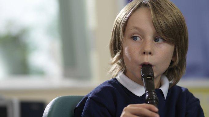 Child playing recorder