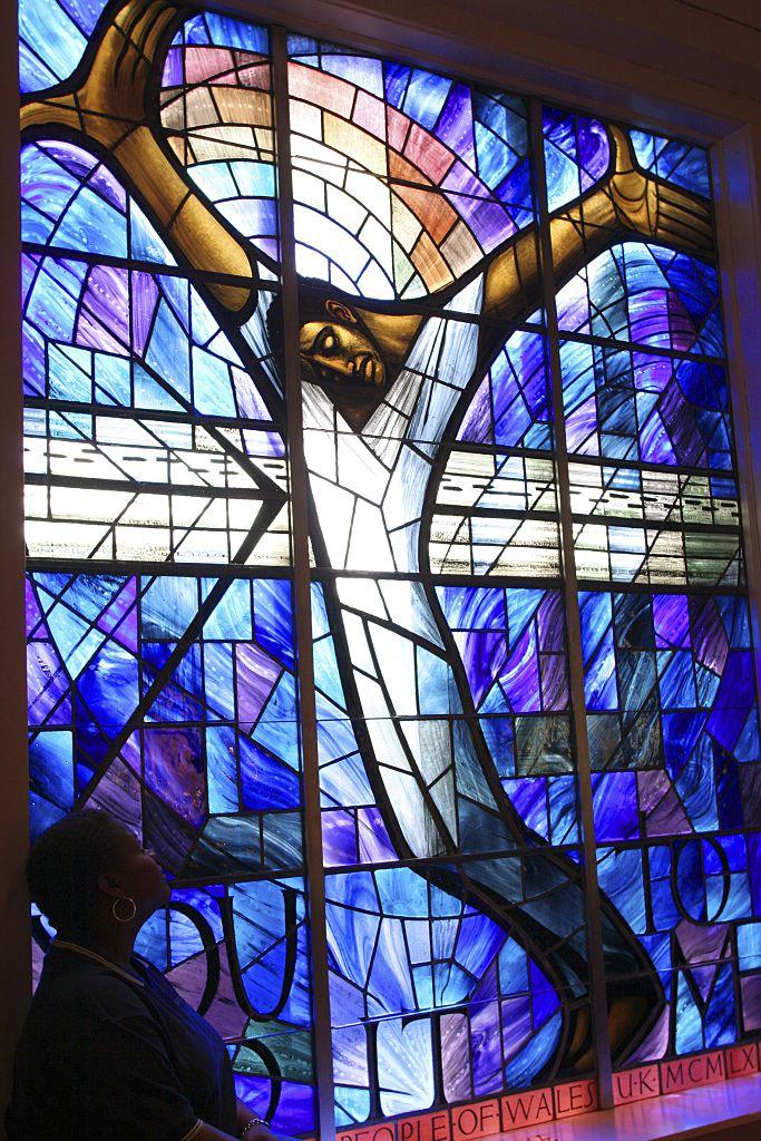 The stained glass window depicting a black Jesus