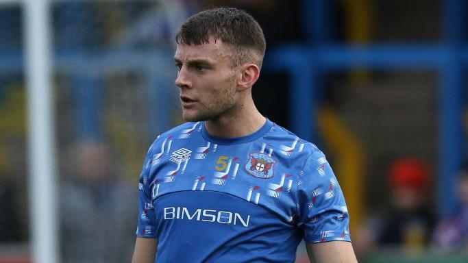 Sam Lavelle in a Carlisle training top