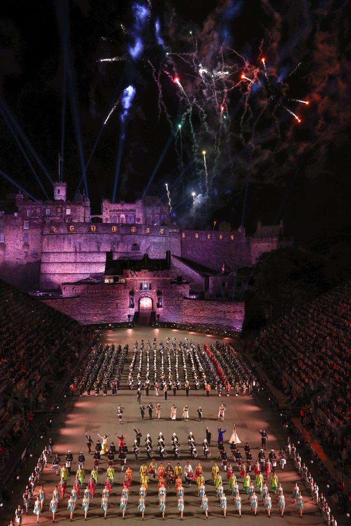 Set against the backdrop of Edinburgh Castle there's a marching military band and fireworks above.