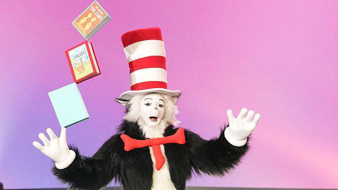 A person dressed Cat in the Hat character 