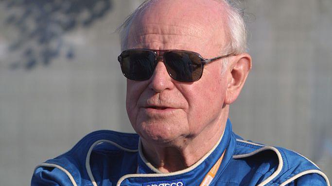 Sid Watkins in his blue doctors' overalls