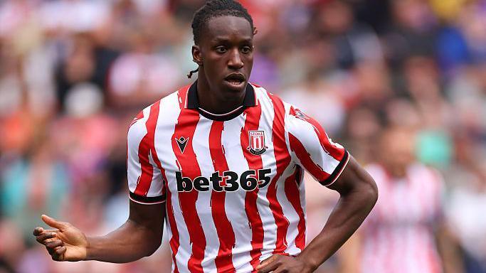 Bosun Lawal in action for Stoke during pre-season
