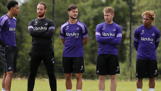 Azeem Abdulai, assistant head coach Ryan Harley, Liam Cullen, Oliver Cooper and Jordi Govea during Swansea City training