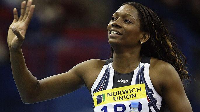 Ashia Hansen of Great Britain waves to the crowd during the Norwich Union Grand Prix held on February 21, 2003 at the National Indoor Arena, in Birmingham