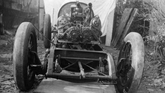 Blue Bird in a dilapidated state, sometime in the 1950s. Most of her bodywork is missing, and the engine components are showing