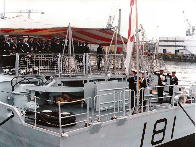 Flag being lowered with soldiers on board