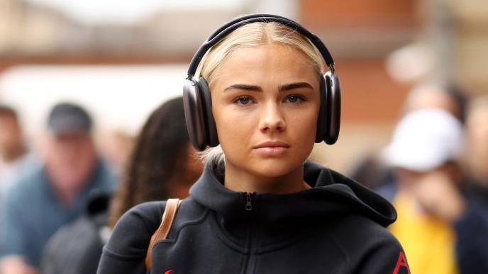 Sofie Lundgaard wearing headphones