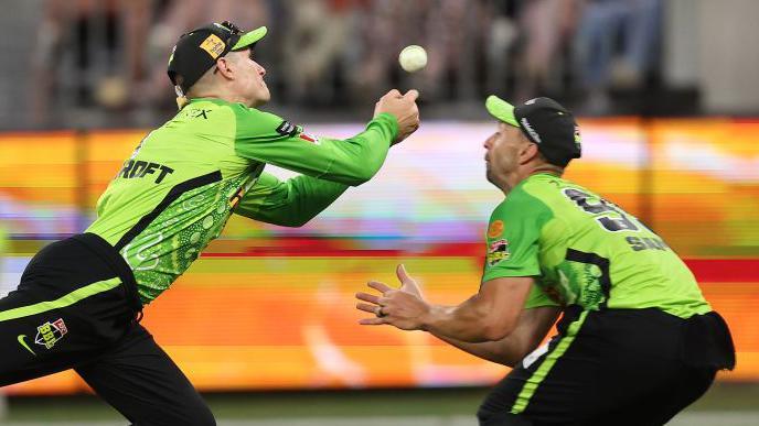 Cameron Bancroft and Daniel Sams collide while fielding for Sydney Thunder against Perth Scorchers