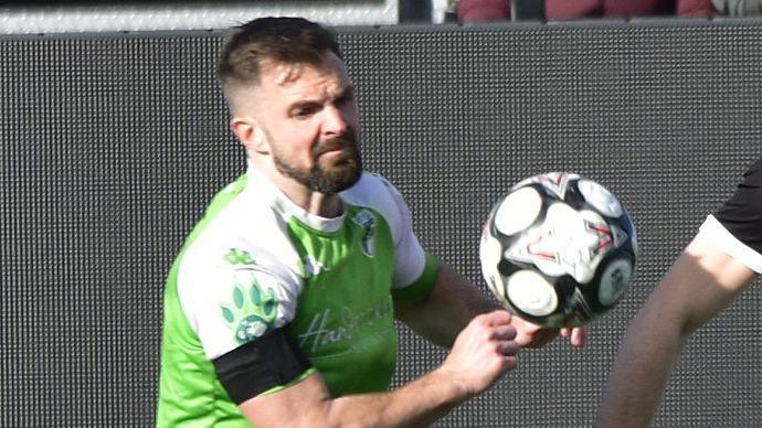 Matt Loaring in action for Guernsey FC