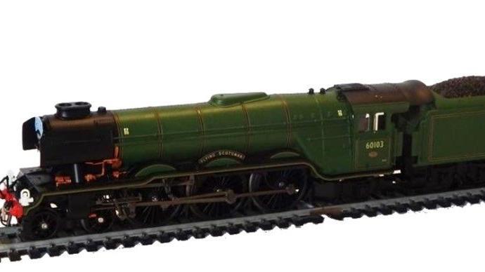 A green Flying Scotsman model train pictured on its tracks was one of those stolen