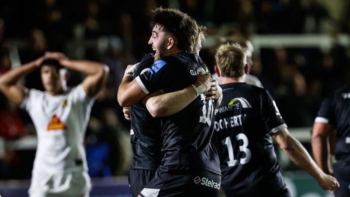 Ethan Grayson celebrating with a team-mate after beating Exeter Chiefs last month