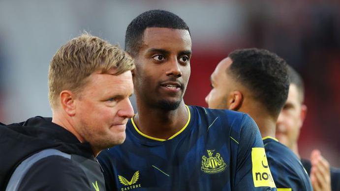 Newcastle manager Eddie Howe with Alexander Isak