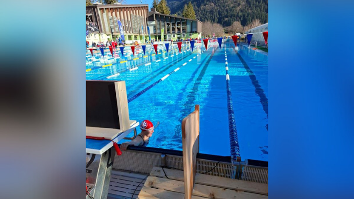 Wendy Bates in the swimming pool during Tuesday's competition. It's a sunny day.