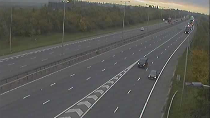 A traffic camera image of the A1 northbound carriageway close to Peterborough. Drivers can be seen coming off the motorway before the closure that was in place earlier. 