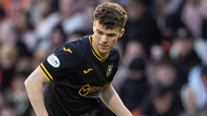 Lewis Smith in action for Livingston
