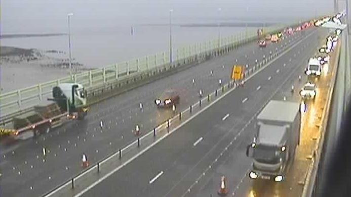 A traffic camera positioned on the westbound carriageway of the M4 Prince of Wales bridge. There is now traffic flowing on the previously closed lane.