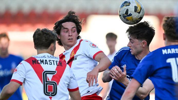 Airdrieonians Rhys Armstrong and Cove Rangers' Declan Glass in action during a William Hill Championship Play-Off Final Second Leg match between Airdrieonians and Cove Rangers at the Albert Bartlett Stadium