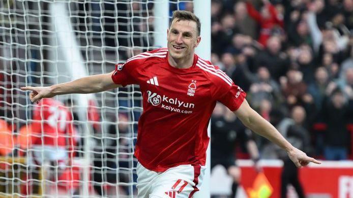 Chris Wood celebrates scoring for Nottingham Forest against Brighton in the Premier League