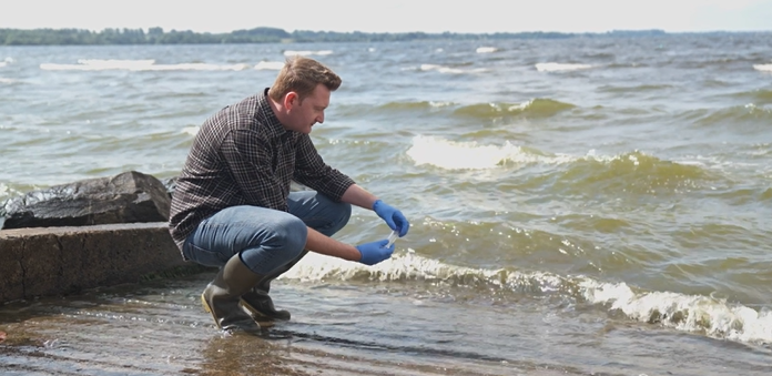 Dr Neil Reid taking samples on the shores of Lough Neagh