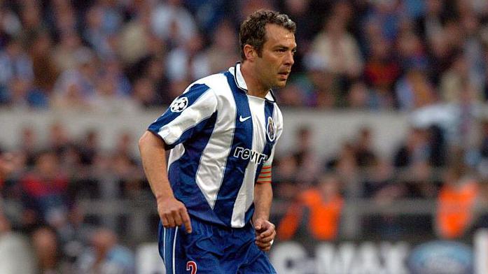 Jorge Costa wearing a blue and white Porto shirt