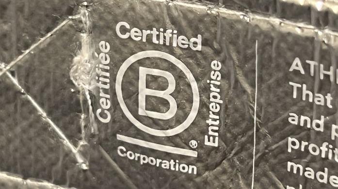 Close up of the B Corp logo on a bag from US brand Athleta