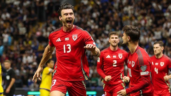 Wales striker Kieffer Moore celebrates