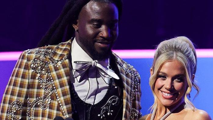 Shaboozey and Megan Moroney presenting an award together