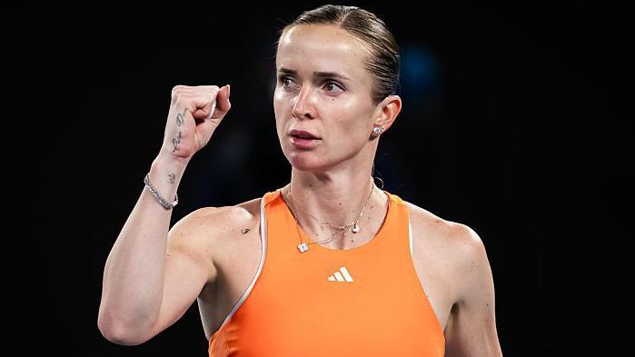 Elina Svitolina celebrates winning at the Australian Open 