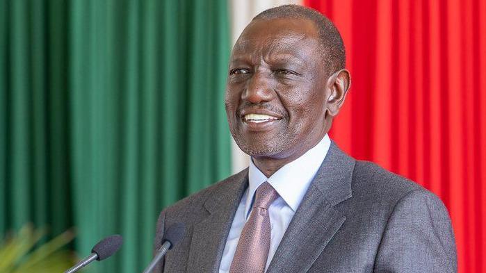 A close-up of President William Ruto in a suit and a tie