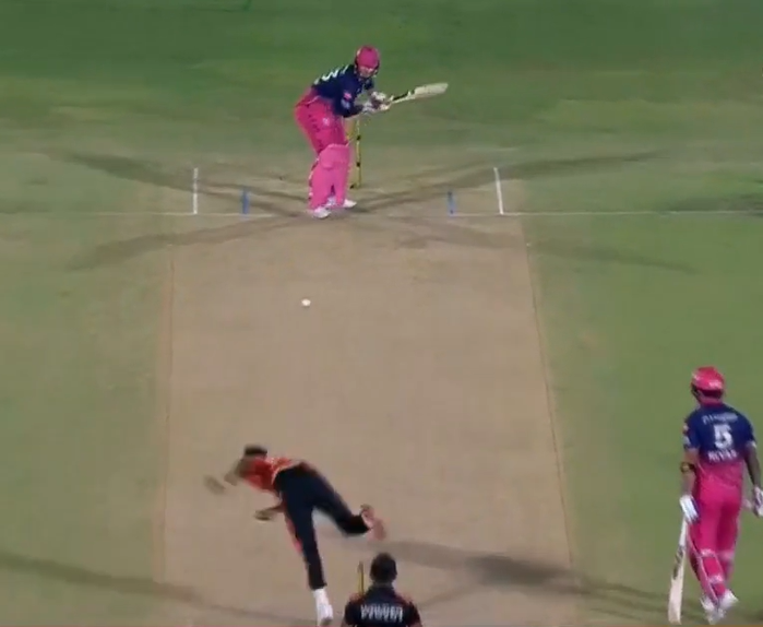 Vaibhav Sooryavanshi's bat moves out towards point as he prepares to make contact