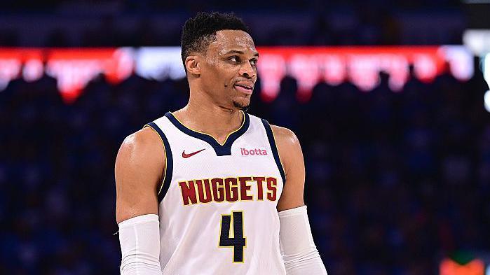 Russell Westbrook looking on in a Denver Nuggets top