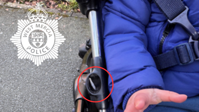 Part of a small child is visible sitting in a pram with their hand outstretched. They are wearing a blue puffer jacket. In a small hole in the pram is a bag of drugs, which has been circled in red.
