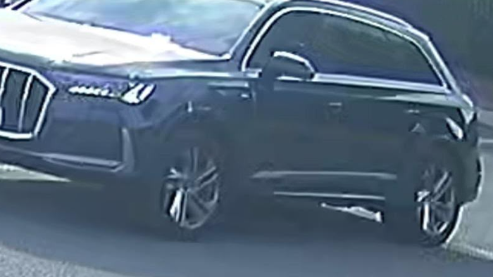 Stolen car captured on CCTV. It is large and black.