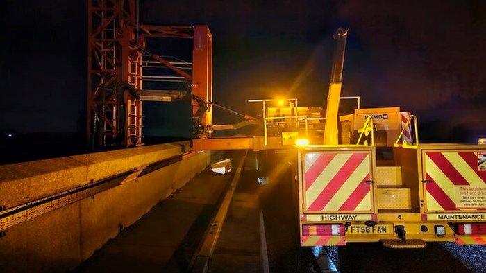 Broken down vehicle on the Orwell Bridge, at night