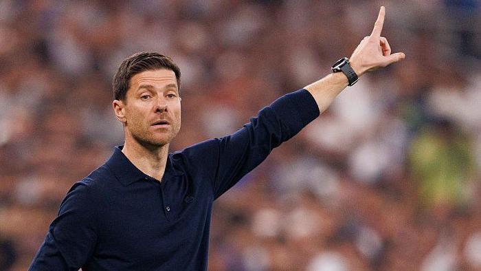 Then Real Madrid manager Xabi Alonso pointing on the touchline