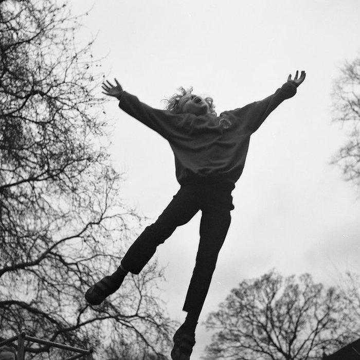 Child jumping through the air