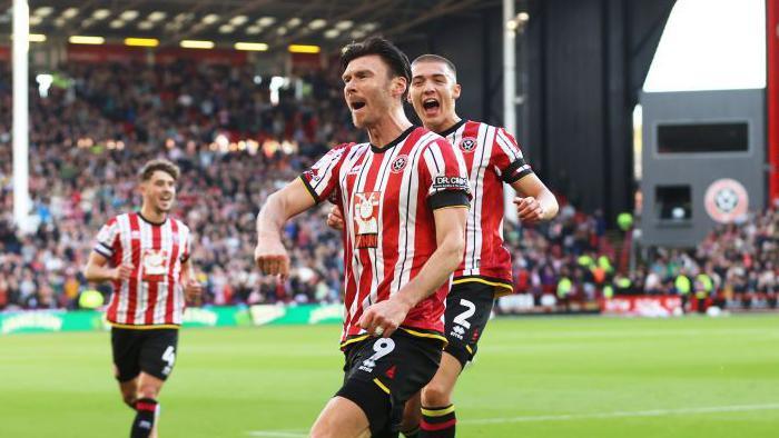 Kieffer Moore punches the air in celebration