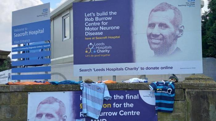 Signs promoting the campaign to build the Rob Burrow Centre for Motor Neurone Disease, at Seacroft Hospital in Leeds.
