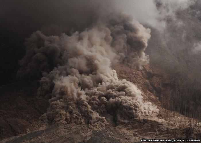 Hot ash as seen during an eruption of Mount Sinabung in Karo Regency, Indonesia's North Sumatra province, June 14, 2015