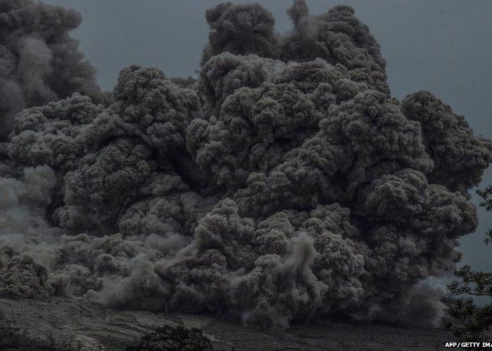 This picture taken on June 13, 2015 shows a close-up of volcanic ash flowing down from Mount Sinabung in Karo