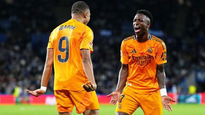 Kylian Mbappe and Vinicius Junior celebrate together