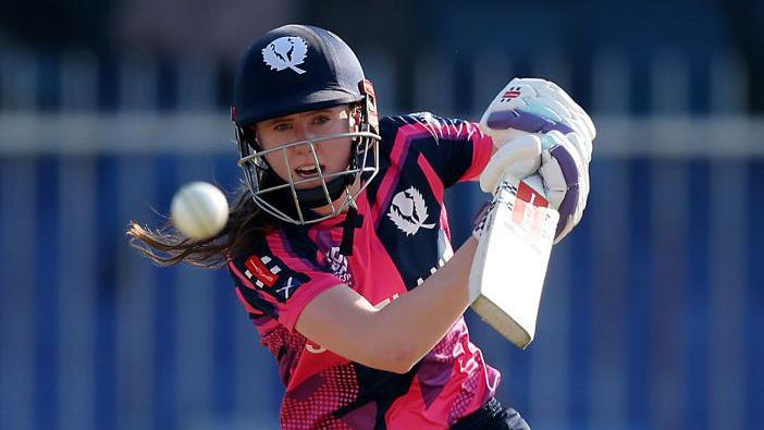 Scotland batter Sarah Bryce watches the ball after playing a shot